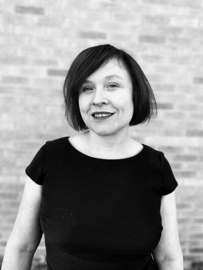 Black and white photo of Administrative Assistant Rose Winland