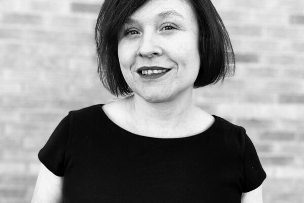 Black and white photo of Administrative Assistant Rose Winland