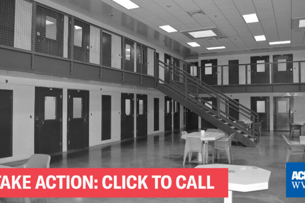 A black and white photo of a cell block with the words "Take Action; Click to Call"