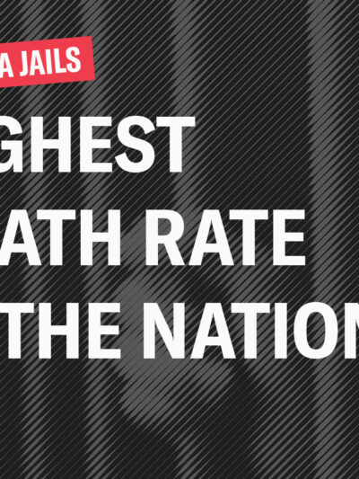 West Virginia Jails Highest Death Rate in the Nation over an image of hands clutching the bars of a cell door