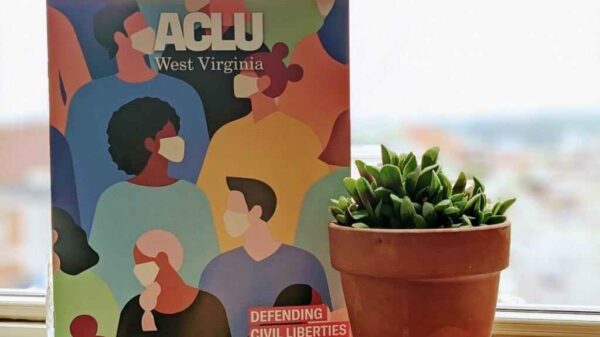 Cover of 2020 magazine is an illustration of masked people in a crowd