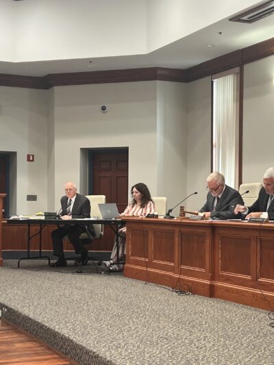 Eli Baumwell delivers remarks to members of the Putnam County Commission