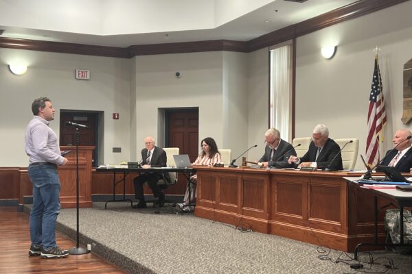 Eli Baumwell delivers remarks to members of the Putnam County Commission