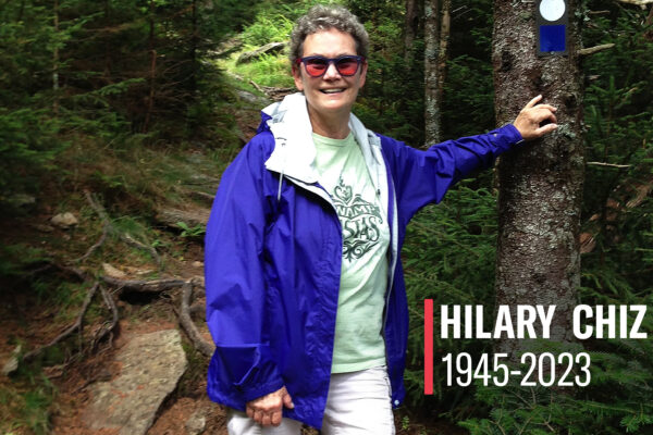 Hilary Chiz is shown hiking in the mountains