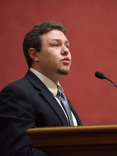 Eli Baumwell speaks at the state Legislature