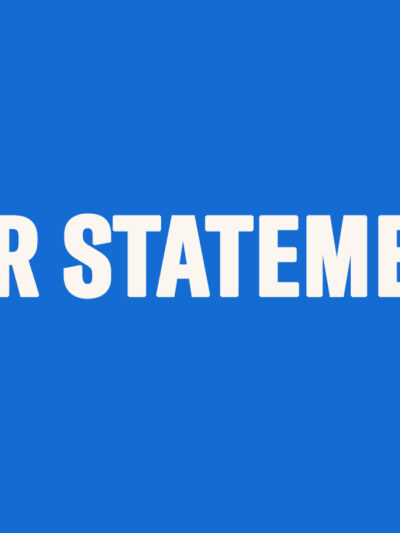 Blue background with white text reading "Our Statement"
