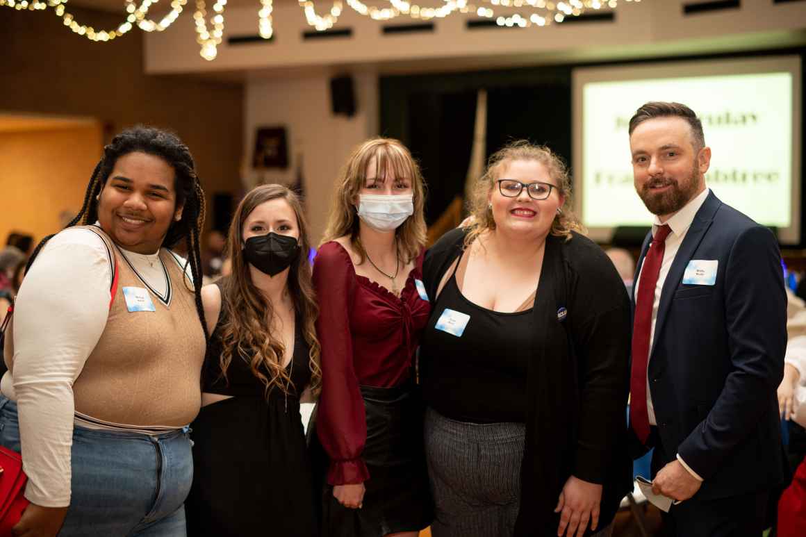 Appalachian Queer Youth Summit campers and counselors pose for a picture at the ACLU-WV Bill of Rights Dinner