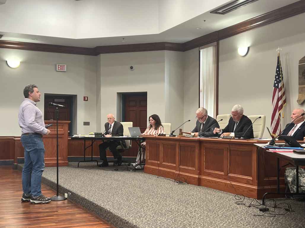 Eli Baumwell delivers remarks to members of the Putnam County Commission