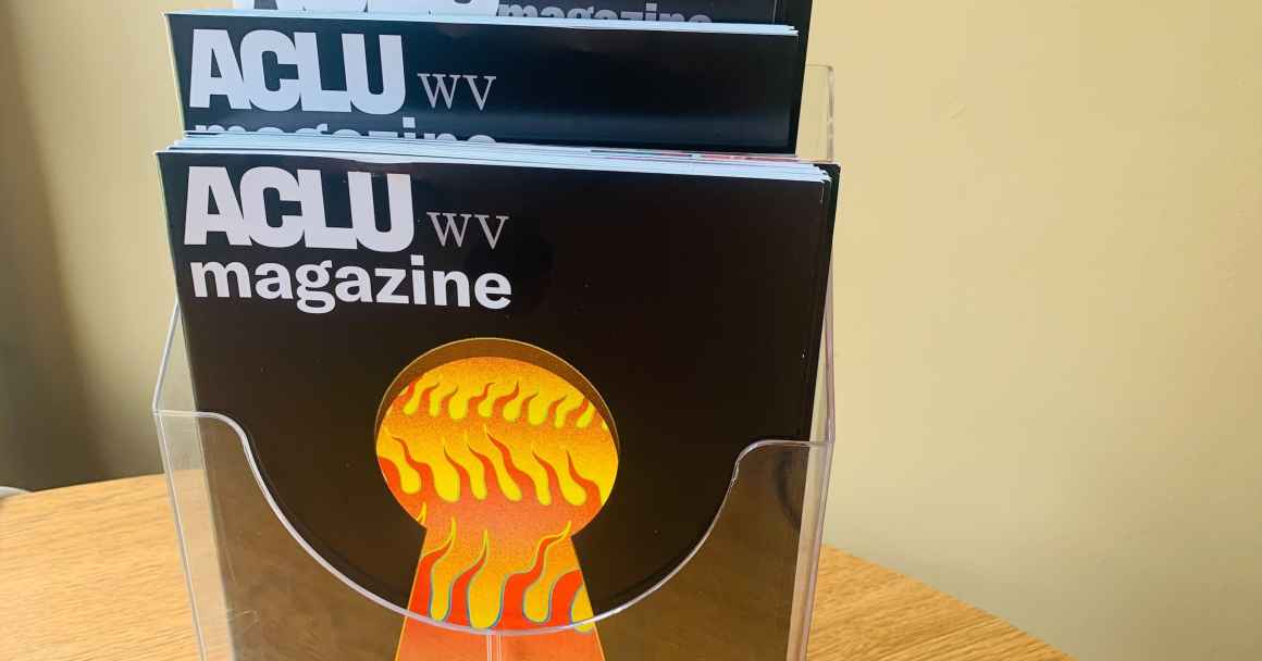 2021 ACLU-WV Magazine cover features image of flames seen through a keyhole with the words: Hate Behind Closed Doors