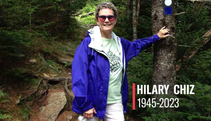 Hilary Chiz is shown hiking in the mountains