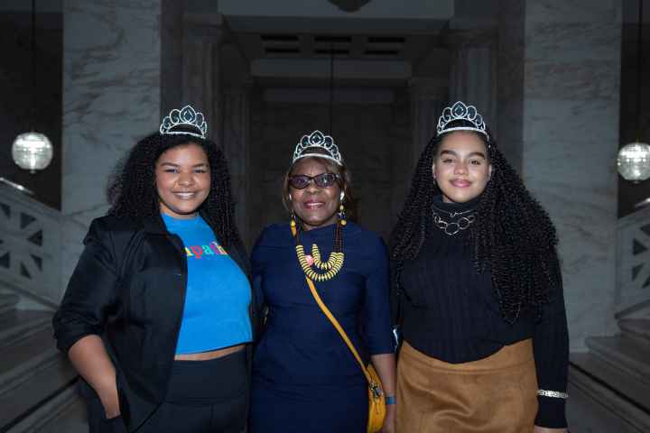 ACLU-WV Youth Organzier Ocean Smith, Board member Sonya Armstrong and legislative intern Jaidyn Carter wear Crowns in support of the Crown Act.