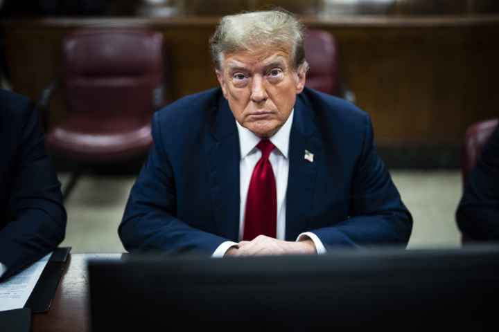 Donald trump looks forward during a legal proceeding