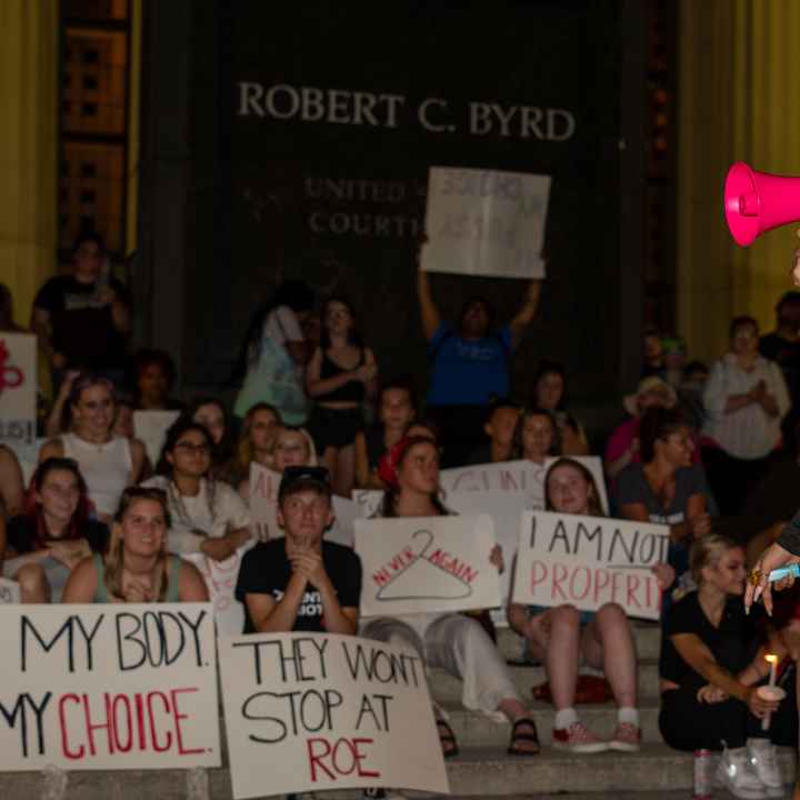 Abortion rights protesters hold signs with messages like "My Body, My Choice" in front of the federal courthouse in Charleston, West Virginia