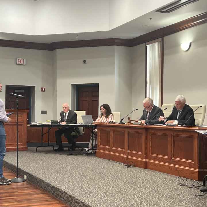 Eli Baumwell delivers remarks to members of the Putnam County Commission