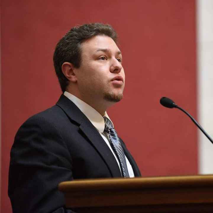 Eli Baumwell speaks at the state Legislature