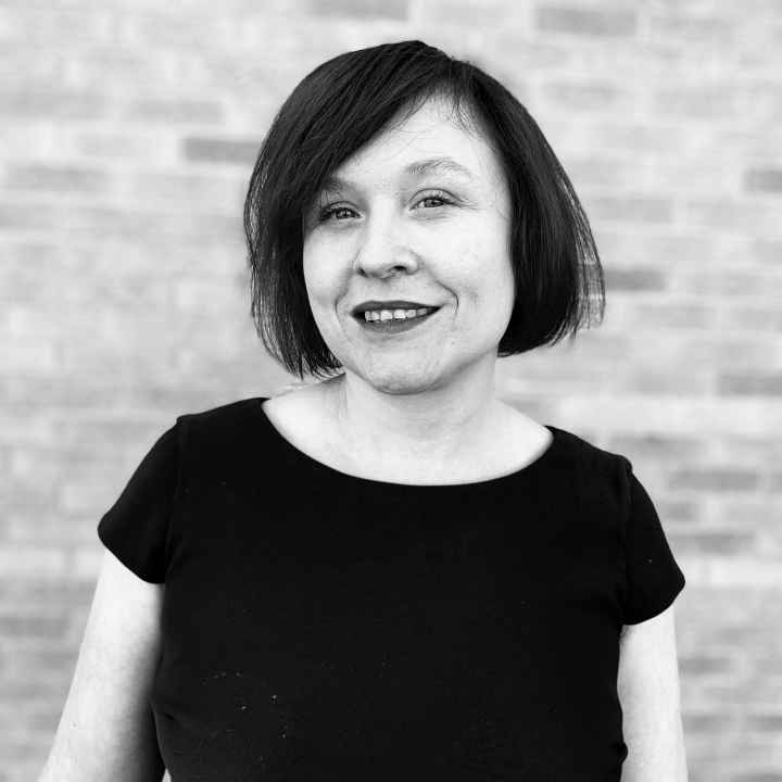 Black and white photo of Administrative Assistant Rose Winland 